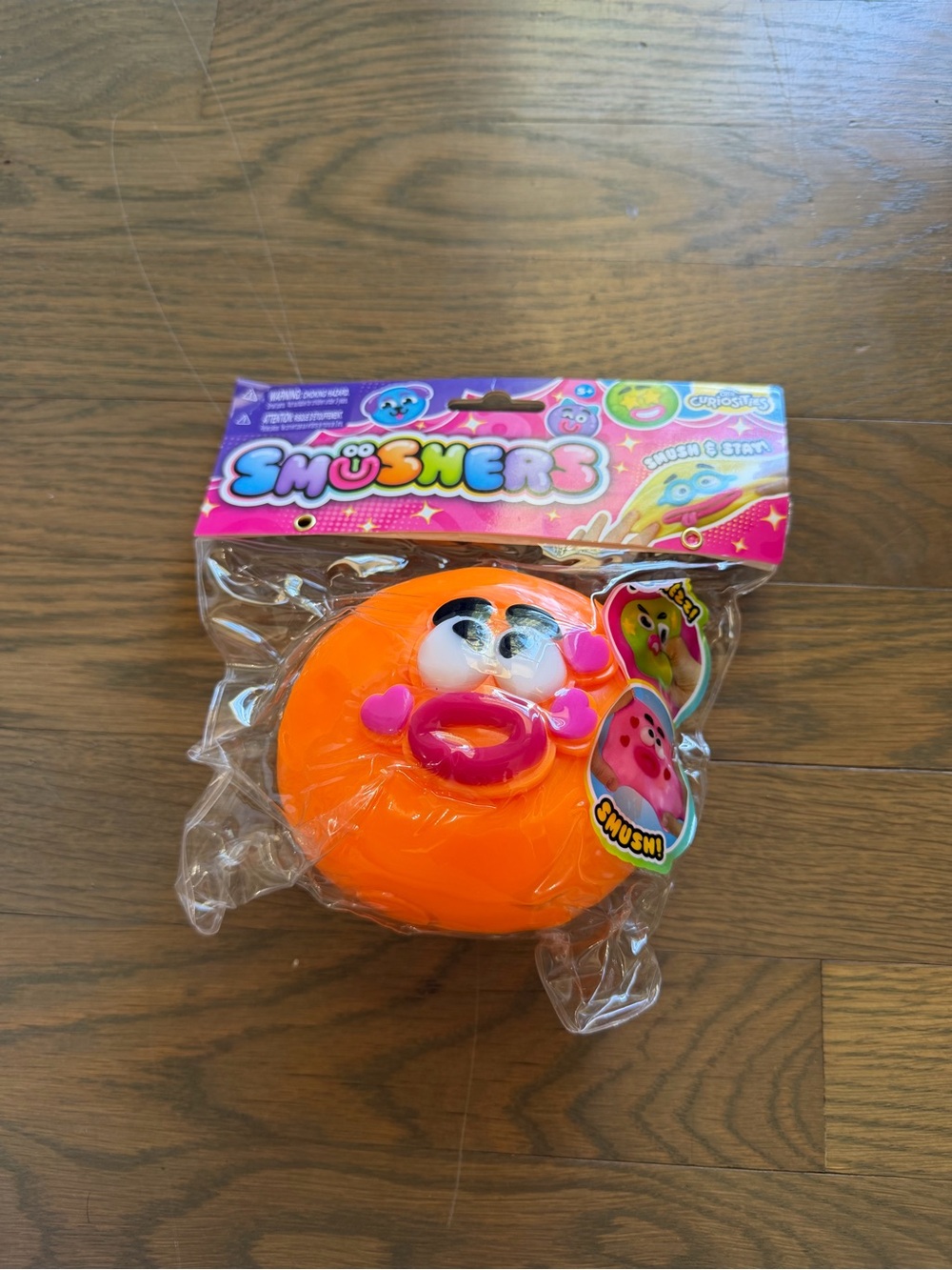 NEW Orb Smushers Orange Squeeze Toy with Pink Heart Mouth
